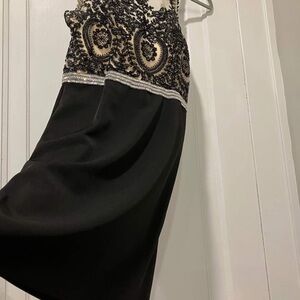 Elegant Black and Cream Dress with Beaded Detail